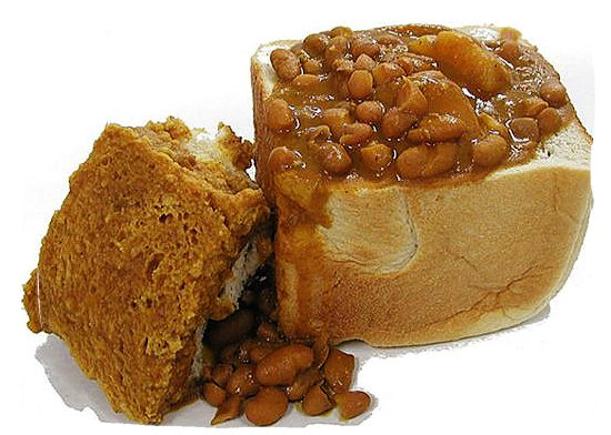The bunny chow, a hollowed out half loaf of bread filled with curry, a typical Indian-South African dish - Delicious food in South Africa, South African food guide
