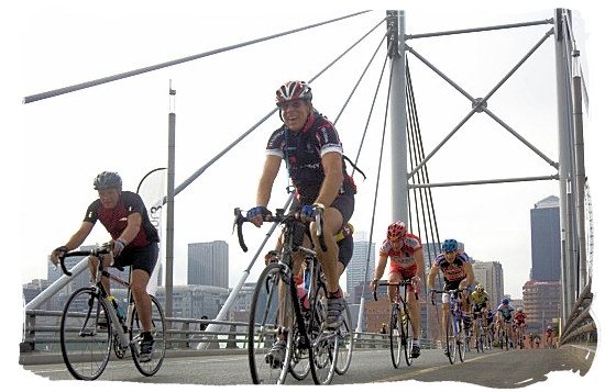 Cyclists crossing the Nelson Mandela Bridge in the city centre of Johannesburg in the 94,7 Highveld cycle Challenge - South Africa Sports Top Ten South African Sports