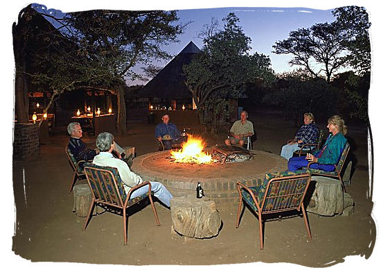 Relaxing around the camp fire after an exciting safari day