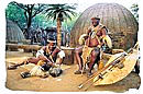 Zulu Chief in front of his dwelling